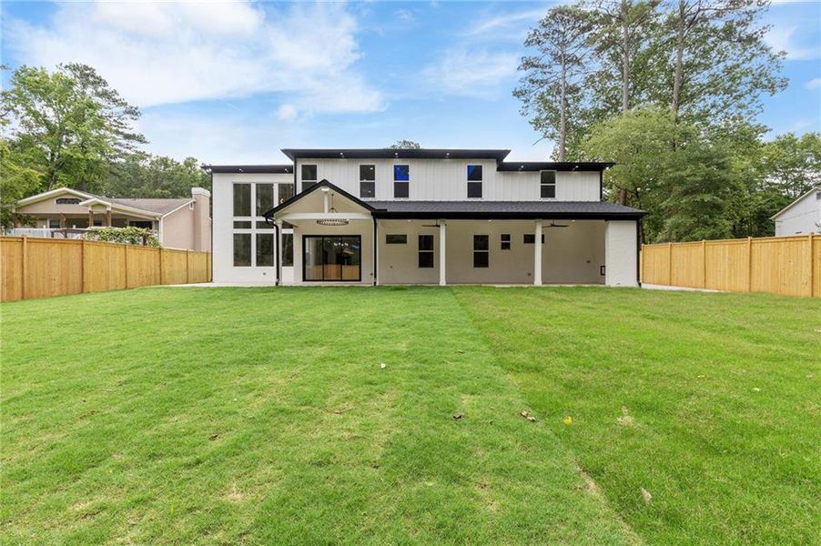 Front exterior of a new home in , Lilburn, GA, highlighting curb appeal (Image 26).