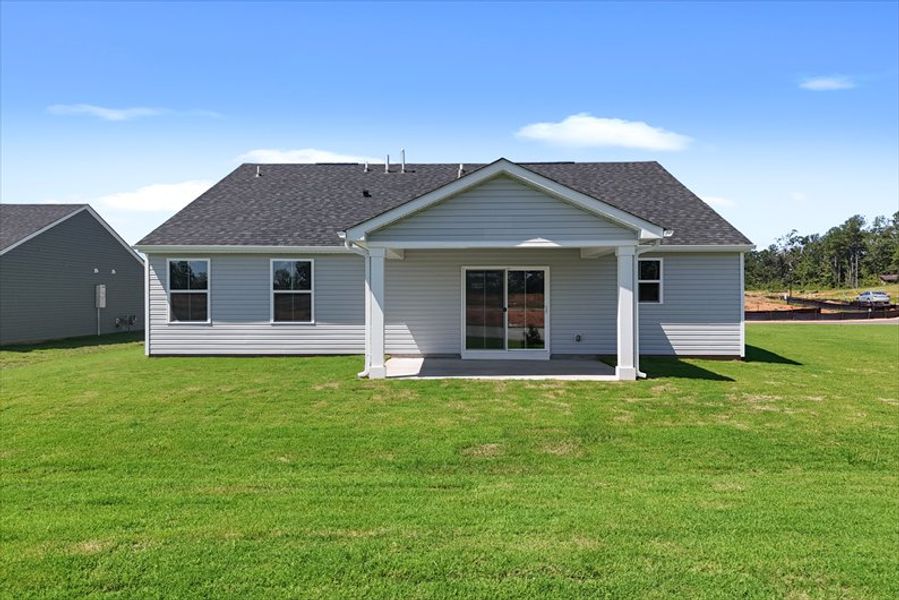 Front exterior of a new home in Bronson Ridge, Greenwood, SC, highlighting curb appeal (Image 2).