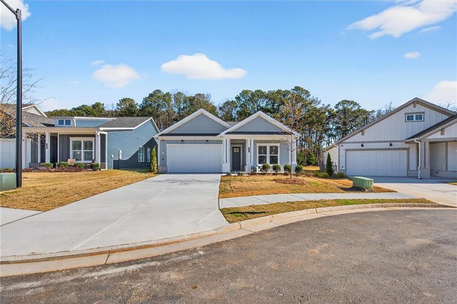 Front exterior of a new home in The Reserve at Bells Ferry, Kennesaw, GA, highlighting curb appeal (Image 26).