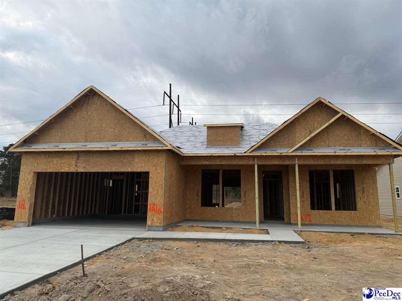 In-progress construction of a new home in The Grove, Florence, SC (Image 3).