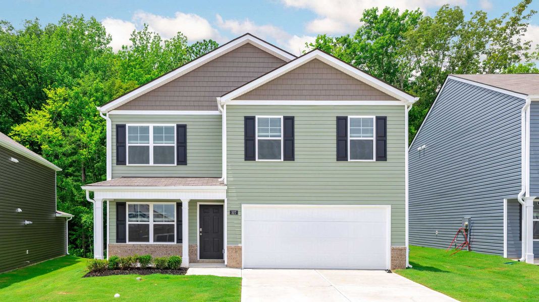 Front exterior of a new home in Owensby Farms, Dayton, TN, highlighting curb appeal (Image 17).