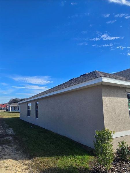 Exterior details and patio area of a home in Wyld Palms, Inverness (Image 16).