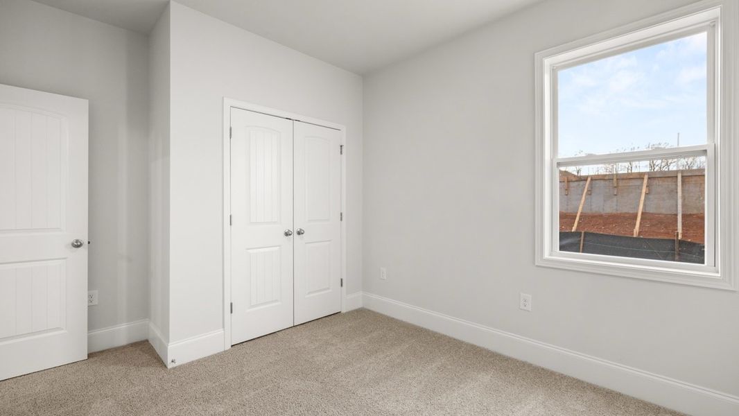 Representative unfurnished interior of a home built from the Grayson by D.R. Horton in Thalley Creek Estates, Cumming (Image 19). Representative unfurnished interior of a home built from the Grayson by D.R. Horton in Thalley Creek Estates, Cumming (Image 19).
