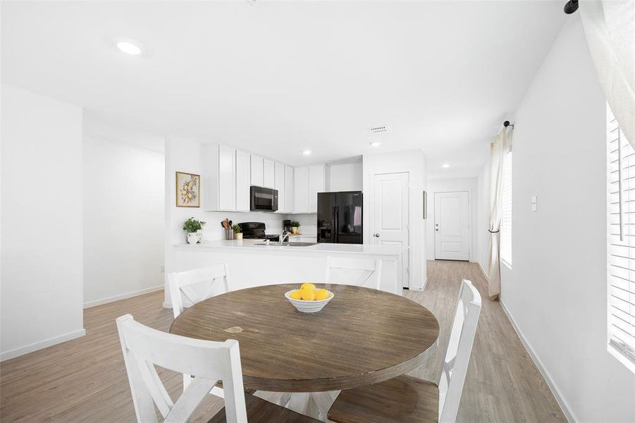 Furnished interior view inside a new home in Mobberly Farms, Pilot Point (Image 11).