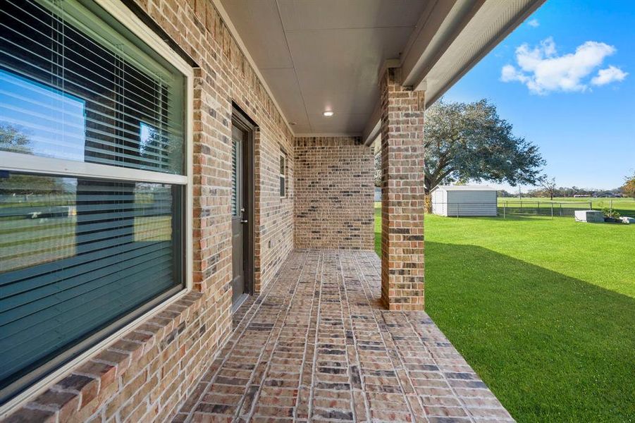 The expansive covered back patio overlooking your large back yard allows ample  room for multiple seating areas. Your home will be the gathering place of family and friends.