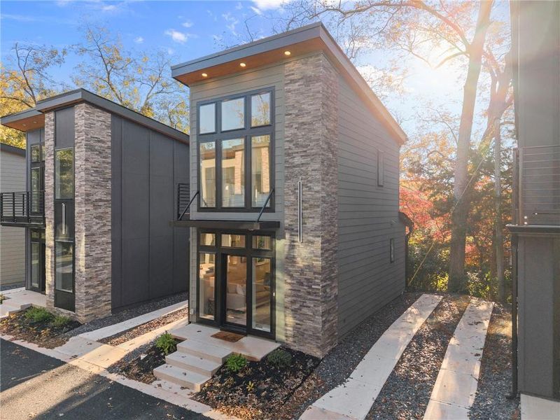 Front exterior of a new home in , Gainesville, GA, highlighting curb appeal (Image 1). Front exterior of a new home in , Gainesville, GA, highlighting curb appeal (Image 1).
