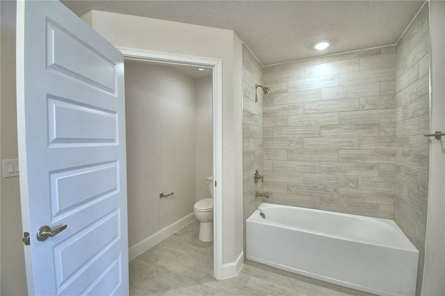 Furnished interior view inside a new home in Lake Juliana Estates, Auburndale (Image 6).