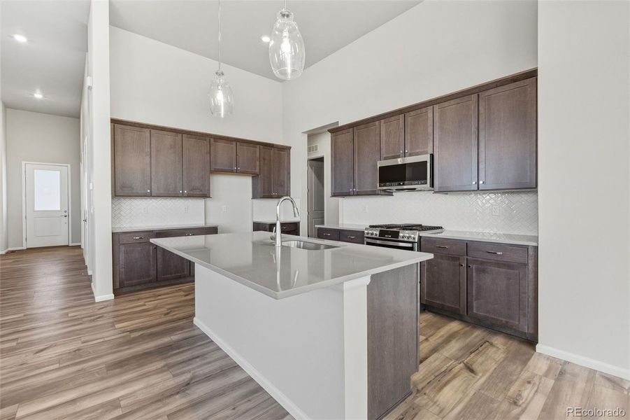 Furnished interior view inside a new home in Talon Pointe, Thornton (Image 7).
