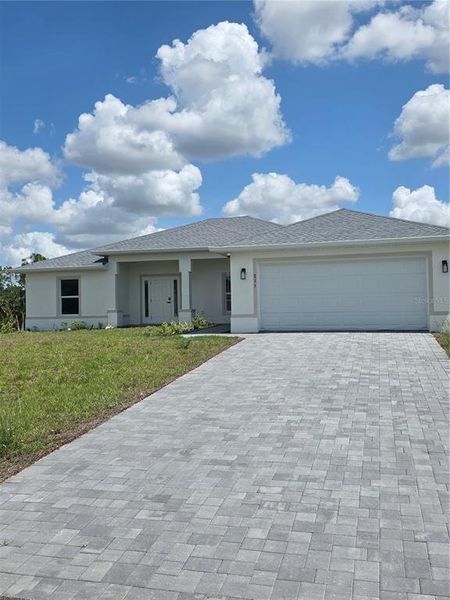 Front exterior of a new home in , Cape Coral, FL, highlighting curb appeal (Image 26).