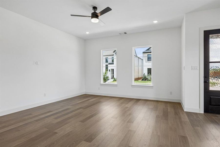 The entire family will love gathering in this spacious and bright family room!