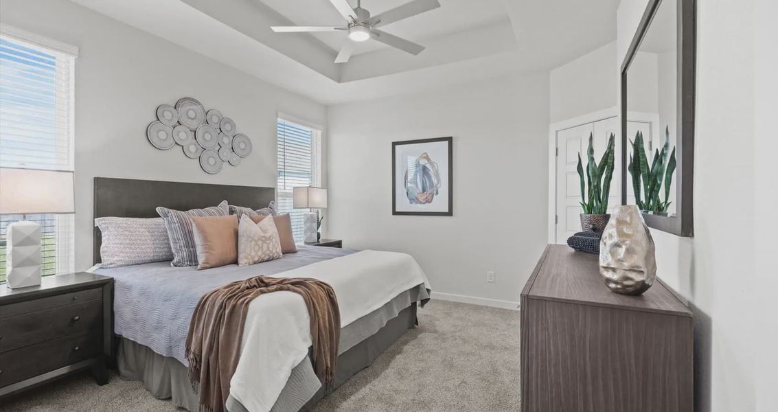 Representative furnished interior of a home built from the Avril by Chesmar Homes in Stream Waters, Buda (Image 22).