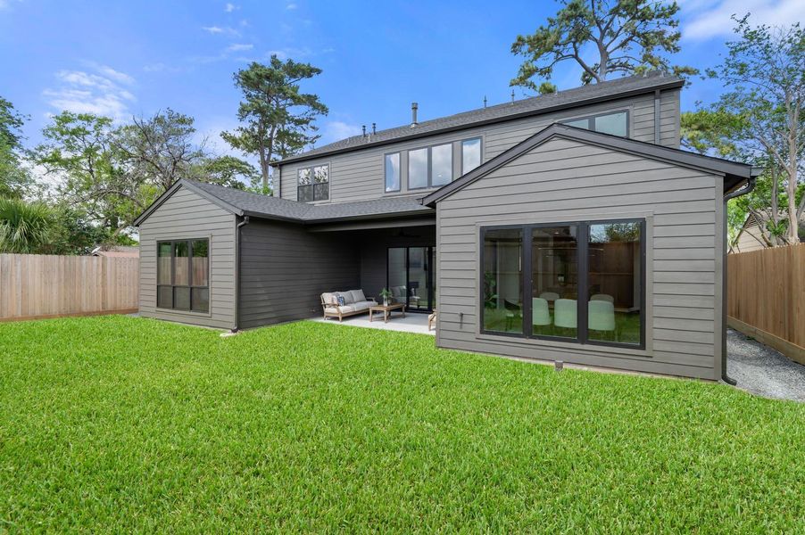 Exterior details and patio area of a home in , Houston (Image 3).