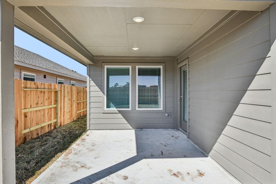 Exterior details and patio area of a home in Landing Meadows - Premier Series, New Caney (Image 3).