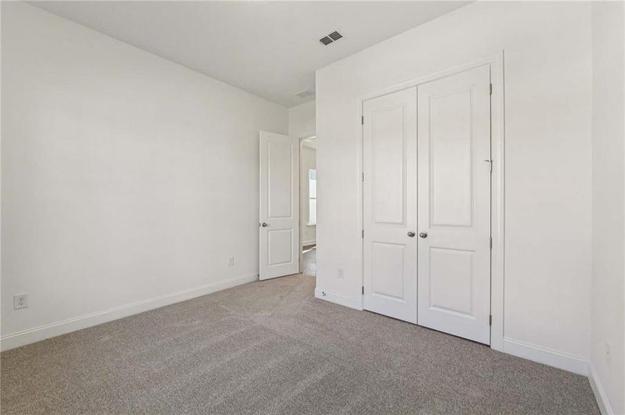 Spacious, unfurnished interior of a new home in East Harbor II at Chestatee, Dawsonville (Image 26).