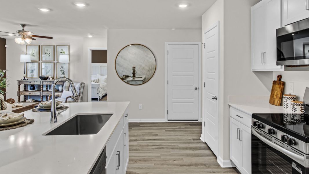 Representative furnished interior of a home built from the Freeport by D.R. Horton in Bailey Park, Fayetteville (Image 21).