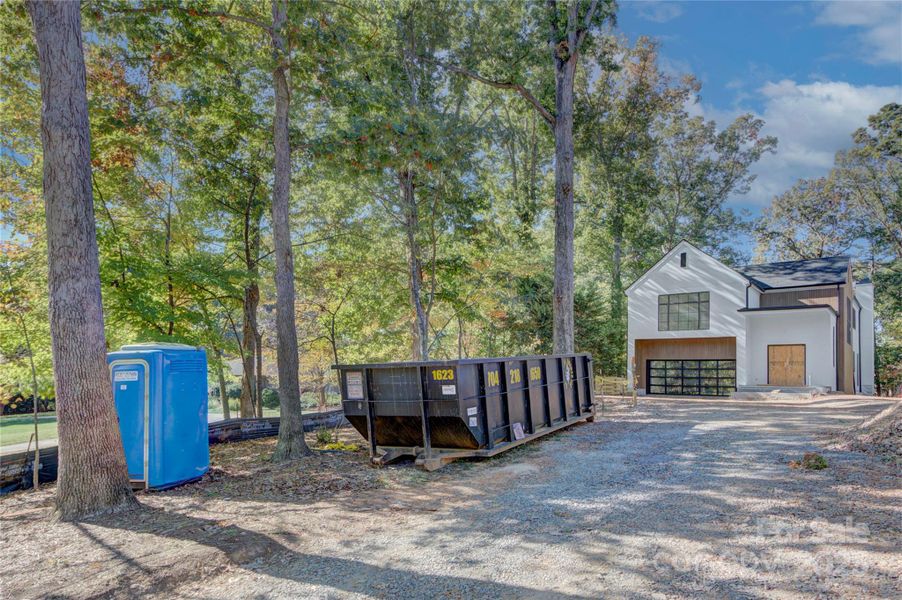 Expansive front yard with mature trees Expansive front yard with mature trees