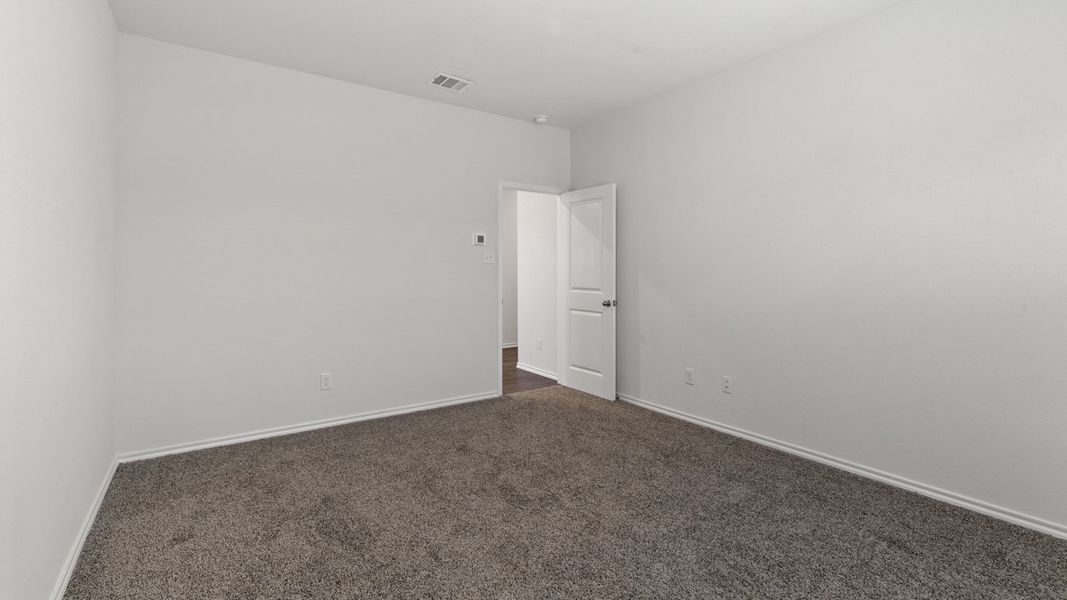 Spacious, unfurnished interior of a new home in Stonewyck Farms, Ennis (Image 20).