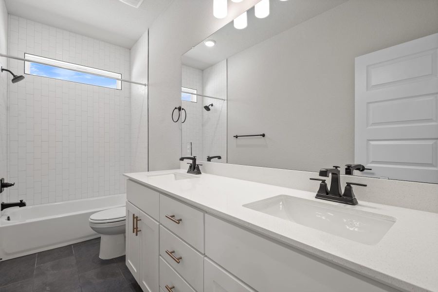 Furnished interior view inside a new home in Wolf Ranch, Georgetown (Image 17).