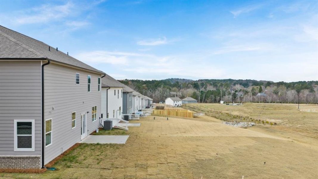 Exterior details and patio area of a home in Hamptons at Riverwood South, Dallas (Image 27).