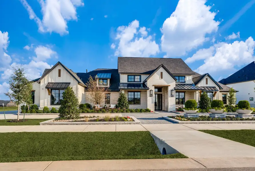 Front exterior of a new home in Hilltop Ranch, Leander, TX, highlighting curb appeal (Image 6).