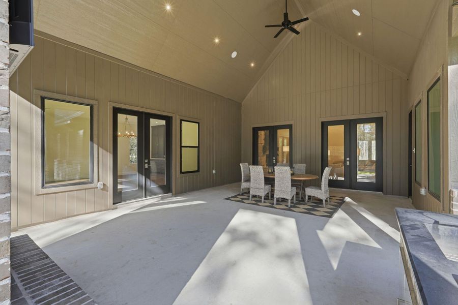 Perfectly positioned off the gameroom and eating area, thecovered back patio creates anatural hub for hosting—blending interior comfort withopen-air living in a way that feelsintentional and inviting.