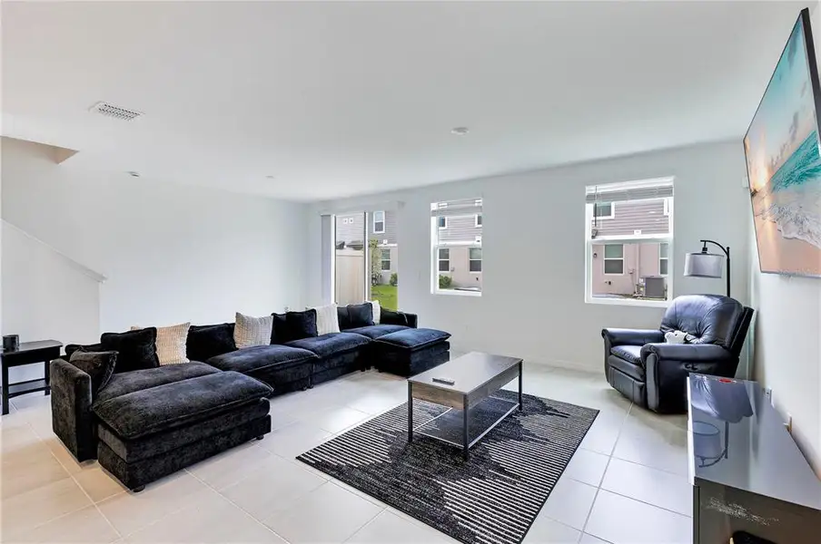 Furnished interior view inside a new home in , St. Cloud (Image 6).