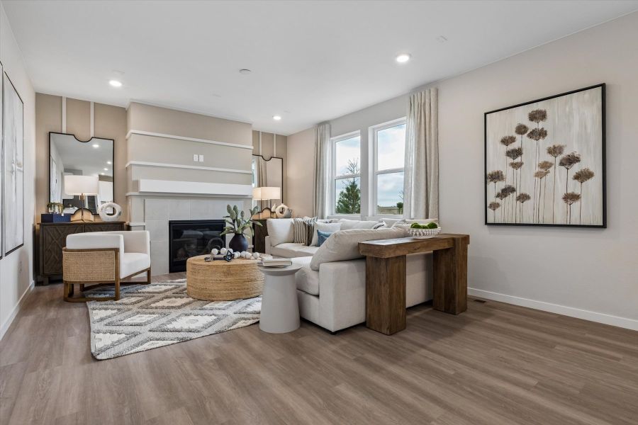 A living room with a fireplace. A living room with a fireplace.