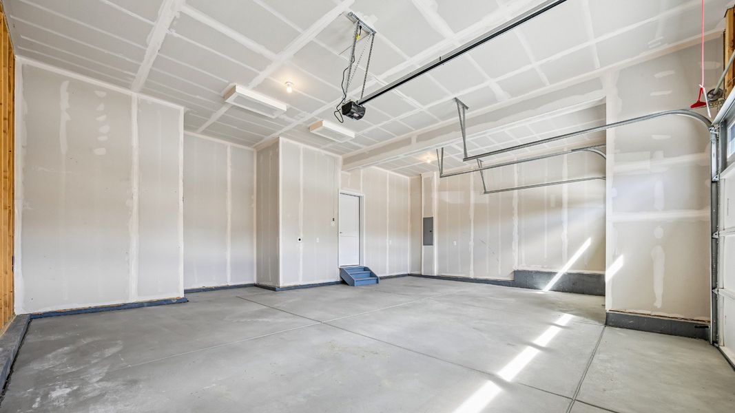 Spacious 3-car garage designed for everyday convenience