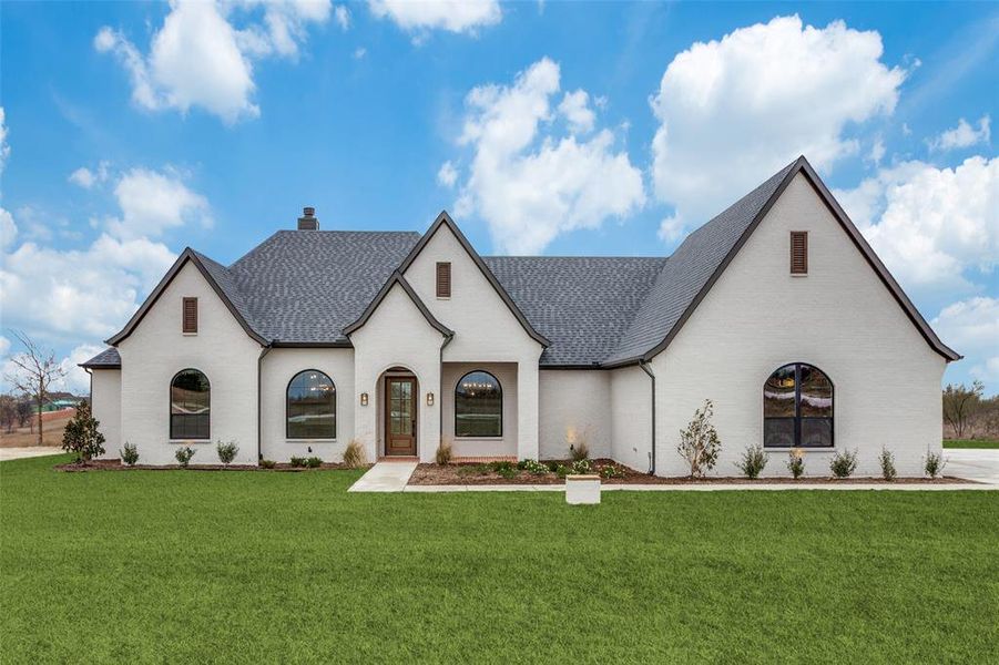 Front exterior of a new home in , Aledo, TX, highlighting curb appeal (Image 1).