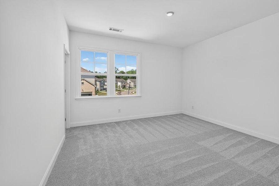 Spacious, unfurnished interior of a new home in Bennett Farm, Loganville (Image 24).
