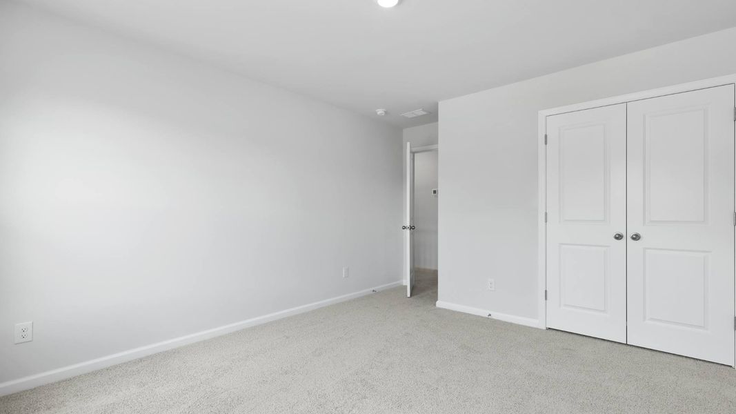 Representative unfurnished interior of a home built from the FORRESTER by D.R. Horton in Founders Corner, Summerville (Image 28).