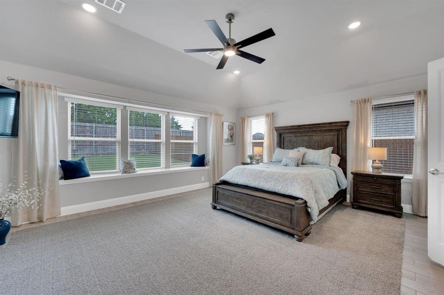 Huge primary bedroom with tons of natural light