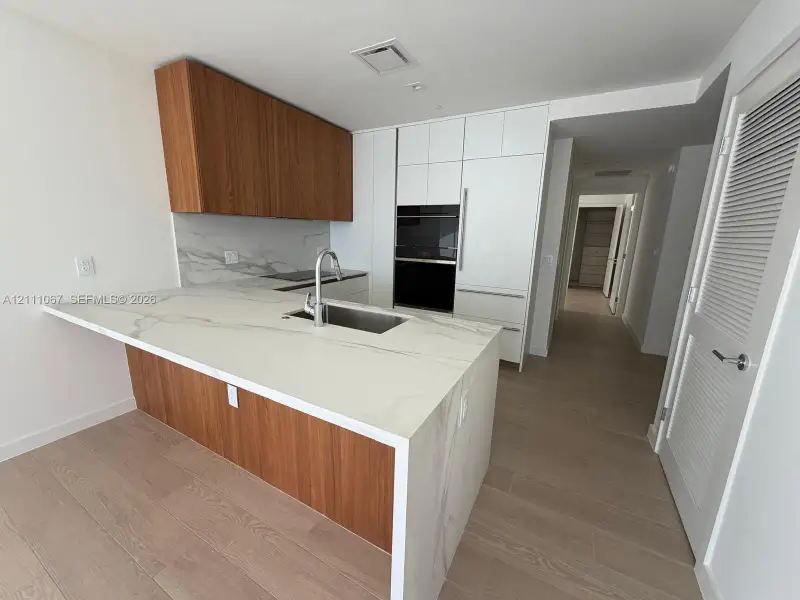 Furnished interior view inside a new home in , Miami (Image 5).