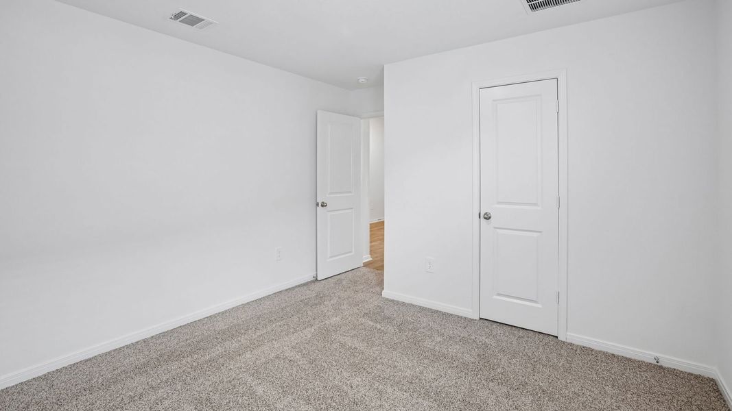 Spacious, unfurnished interior of a new home in Prairie Lakes, Buda (Image 36).