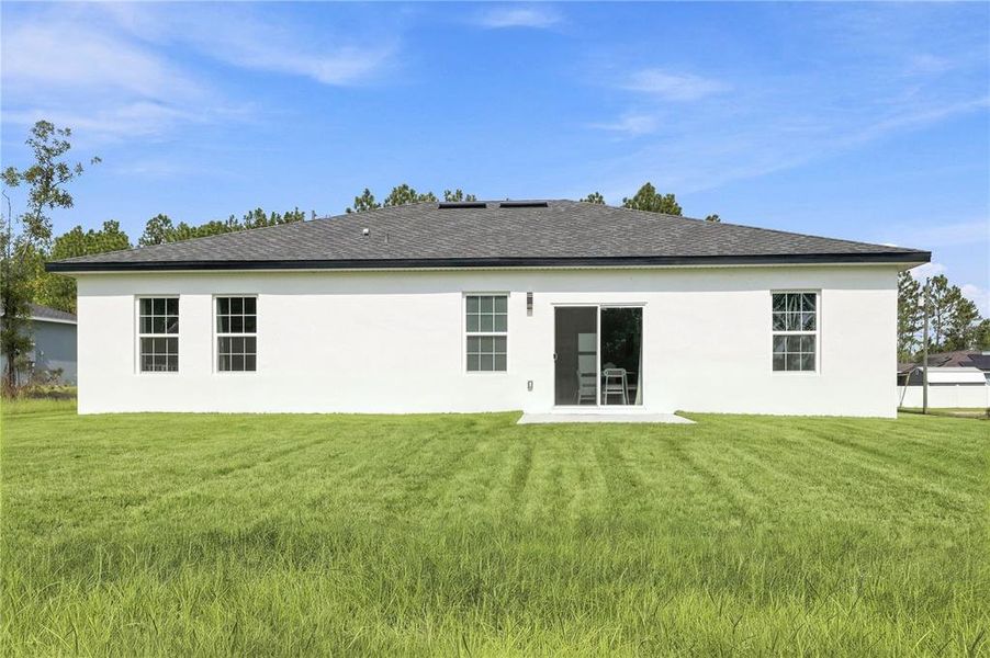 Exterior details and patio area of a home in , Ocala (Image 24).