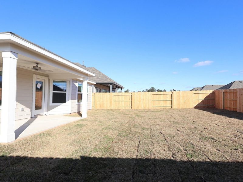 Exterior details and patio area of a home in Lone Star Landing, Montgomery (Image 19). Exterior details and patio area of a home in Lone Star Landing, Montgomery (Image 19).