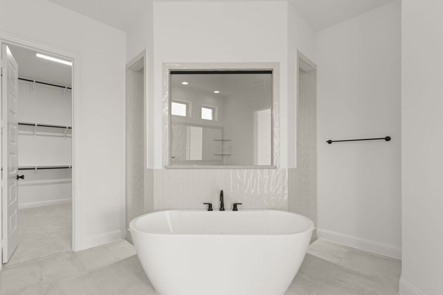 Representative furnished interior of a home built from the Somerset by Windsor Homes in Winding Creek, Rockwall (Image 13).