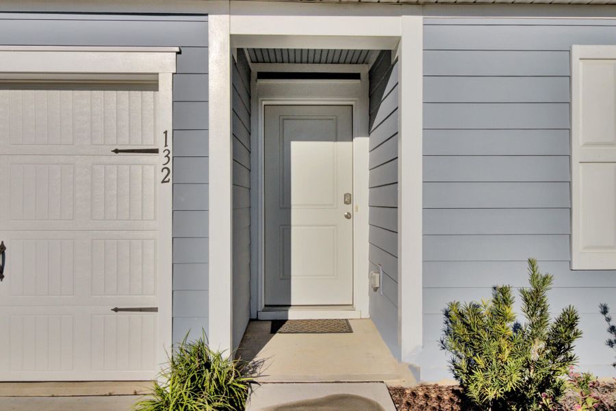 Exterior details and patio area of a home in Center Pointe, Santee (Image 3). Exterior details and patio area of a home in Center Pointe, Santee (Image 3).