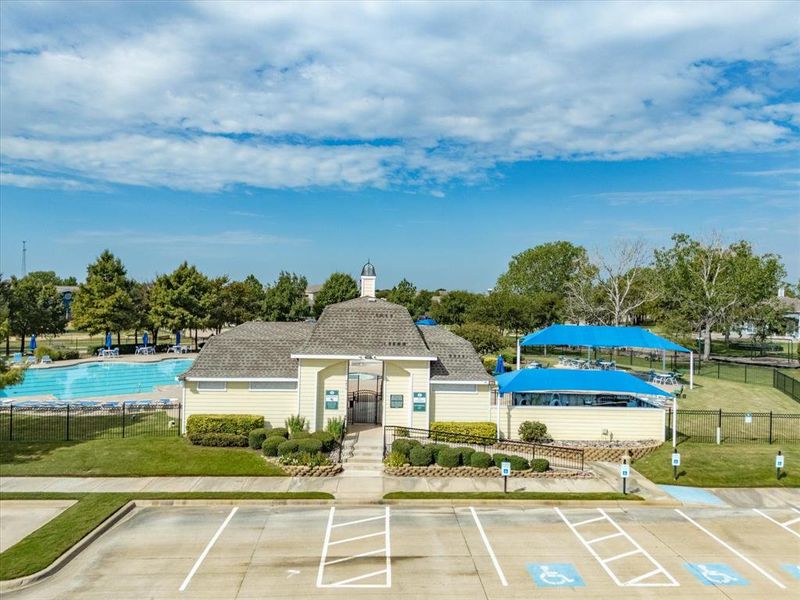 View of property featuring uncovered parking View of property featuring uncovered parking