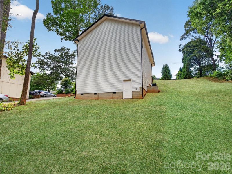 Exterior details and patio area of a home in , Hickory (Image 3).