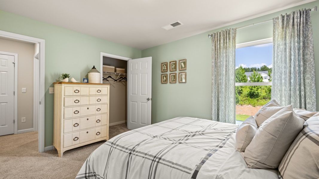 Representative furnished interior of a home built from the Elle by D.R. Horton in The Preserve at Agricultural Village, Perry (Image 35).