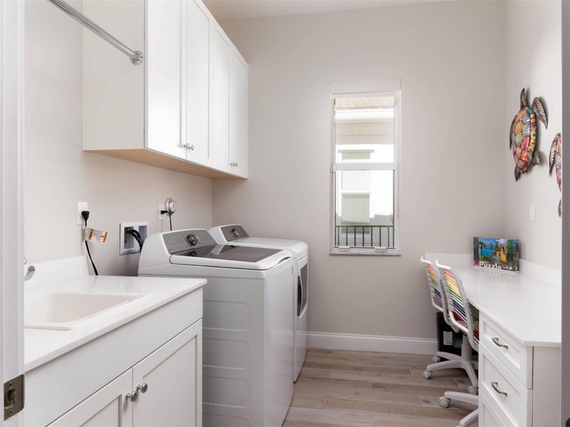 Furnished interior view inside a new home in La Terre at Avenir, Palm Beach Gardens (Image 13). Furnished interior view inside a new home in La Terre at Avenir, Palm Beach Gardens (Image 13).