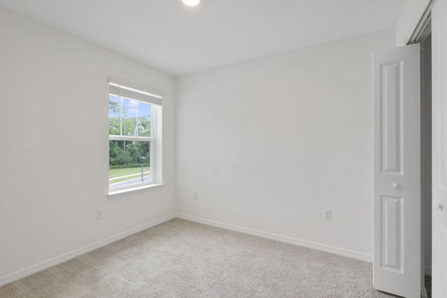 Spacious, unfurnished interior of a new home in Towns at Riverwalk, Sanford (Image 27).