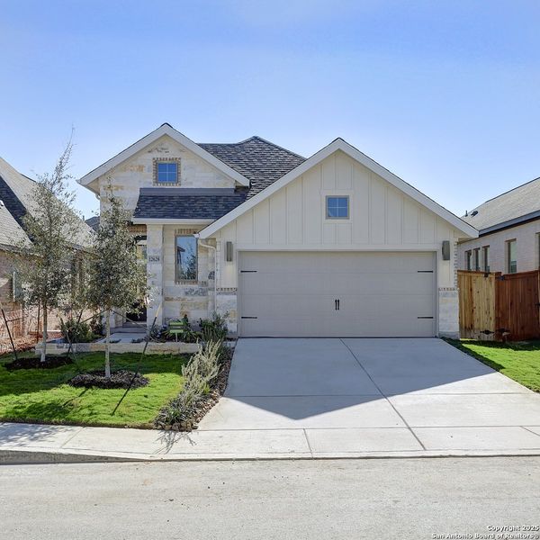 Front exterior of a new home in Stillwater Ranch 40', San Antonio, TX, highlighting curb appeal (Image 21). Front exterior of a new home in Stillwater Ranch 40', San Antonio, TX, highlighting curb appeal (Image 21).
