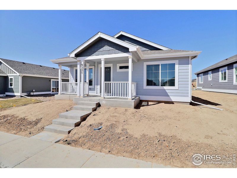 Front exterior of a new home in , Evans, CO, highlighting curb appeal (Image 19). Front exterior of a new home in , Evans, CO, highlighting curb appeal (Image 19).