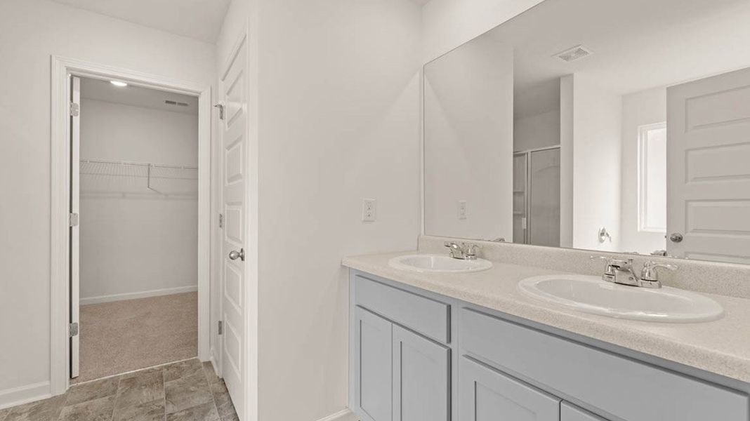 Representative furnished interior of a home built from the Packard by D.R. Horton in Evergreen Crossing, Locust Grove (Image 9).