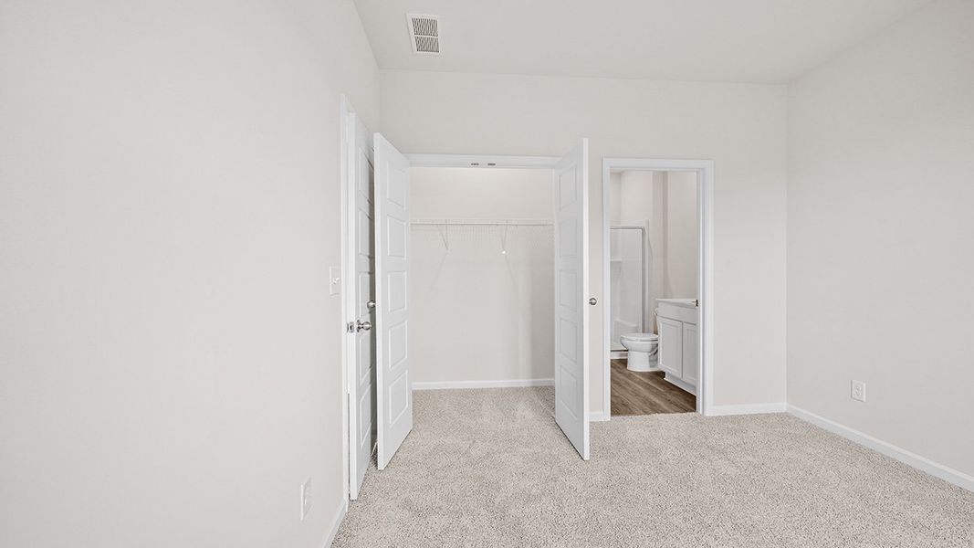 Representative unfurnished interior of a home built from the Edgewood Express - Duplex by D.R. Horton in Remington Chase, Perry (Image 21).