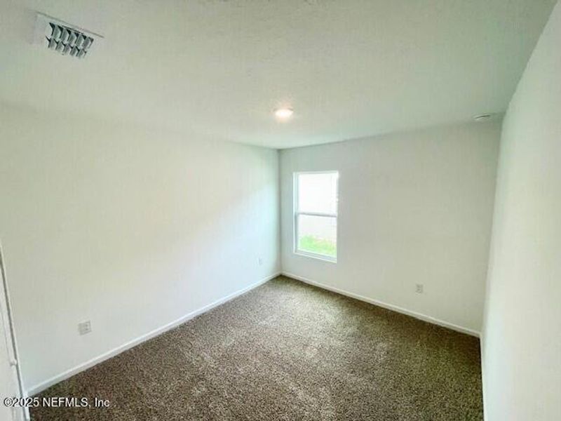 Spacious, unfurnished interior of a new home in Grand Reserve, Bunnell (Image 21).