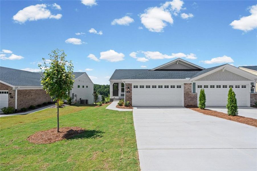 Front exterior of a new home in Villas at Gold Creek, Dawsonville, GA, highlighting curb appeal (Image 18).