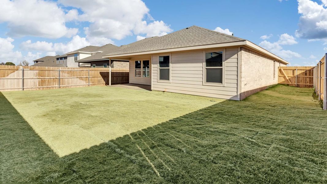 Exterior details and patio area of a home in Overlook West, Wolfforth (Image 14).